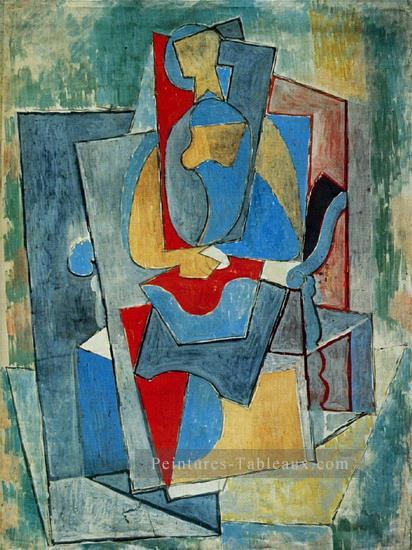 Femme assise dans un fauteuil rouge 1932 cubiste Pablo Picasso Peintures à l'huile